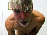 Gay DILF Richard Lennox's big cock in pantyhose